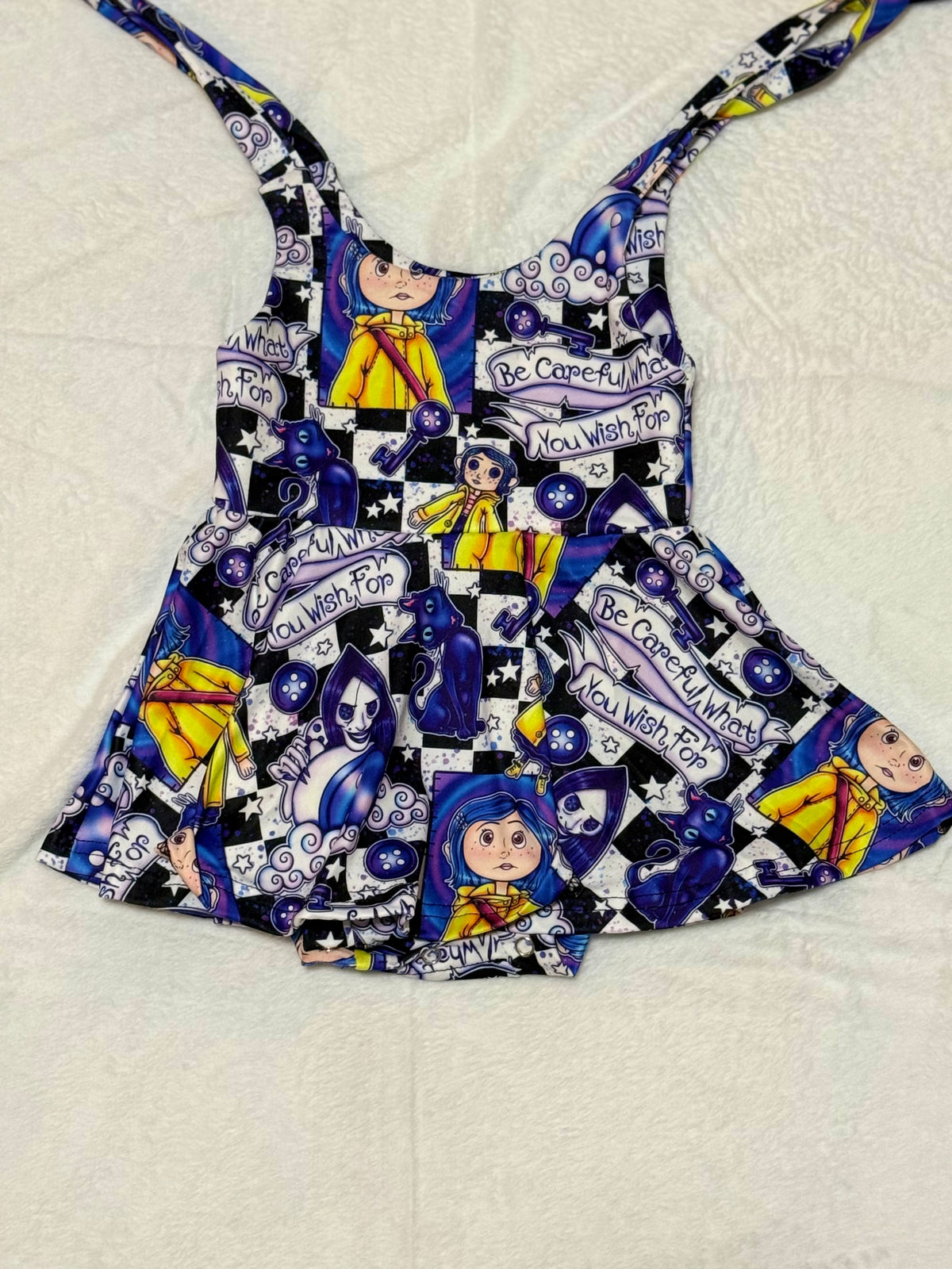 Button Eyes Peplum Dress